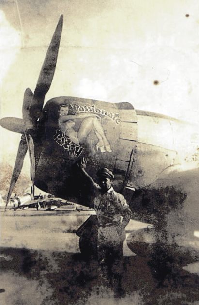 Kenny Cox next to his P-47 Thunderbolt