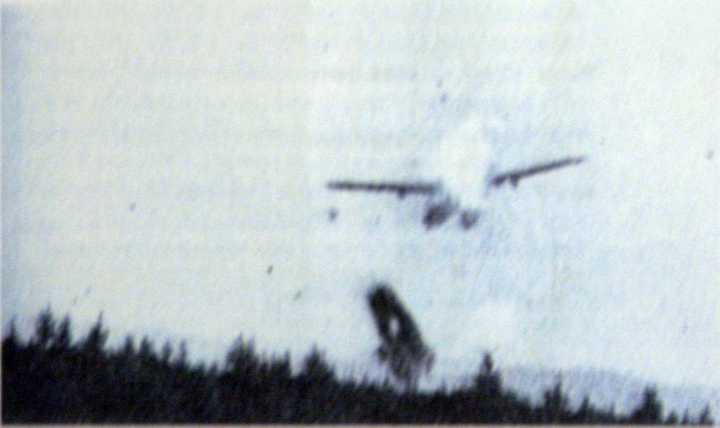 A photo of a B-24 Liberator Crashing after the Ploesti Raid.