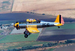 Dan Collier flies his beautifully restored vintage Ryan PT-22 Airplane over Southern California
