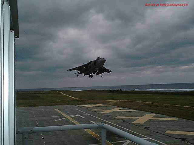 an av8b harrier jump jet lands on the island of ie shima