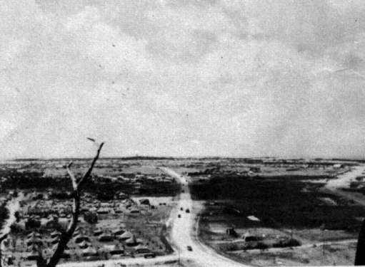 Photo of a Road on Iejima in World War 2 showing Tent City