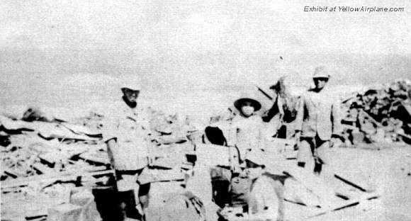 Workers cleaning up the rubble in WW2 Ie Shima