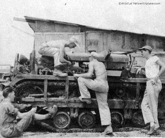 Motor Pool Workers working on a tracked vehicle on Ie Shima, World War 2