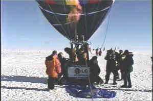 A hot air balloom prepares for takeoff.