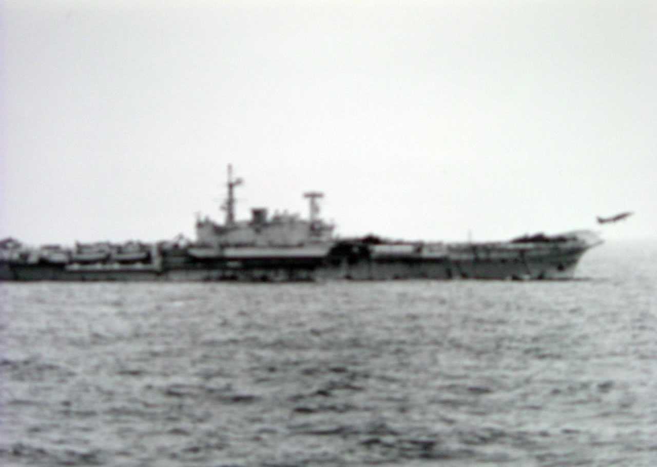 HMS Hermes with a Harrier Taking Off