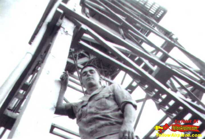 John Spiegel standing next to the Airport Control Tower in India during WW2