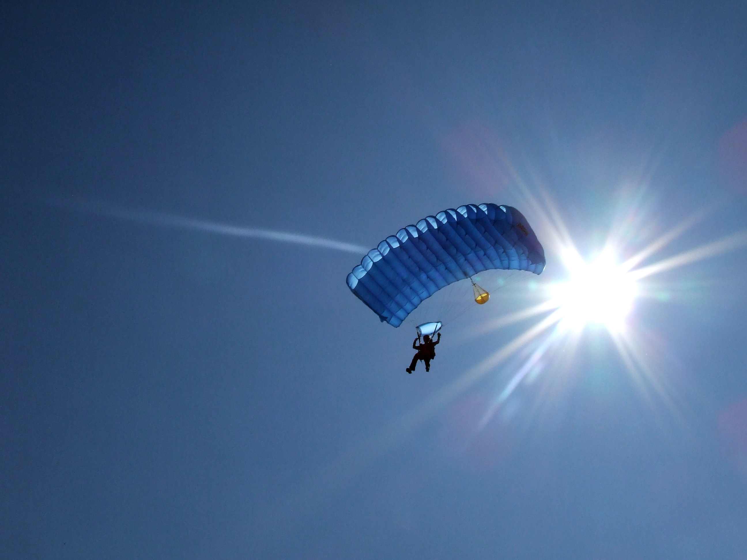 Fantastic Skydiving Picture as Diana Parachutes out of the Sun