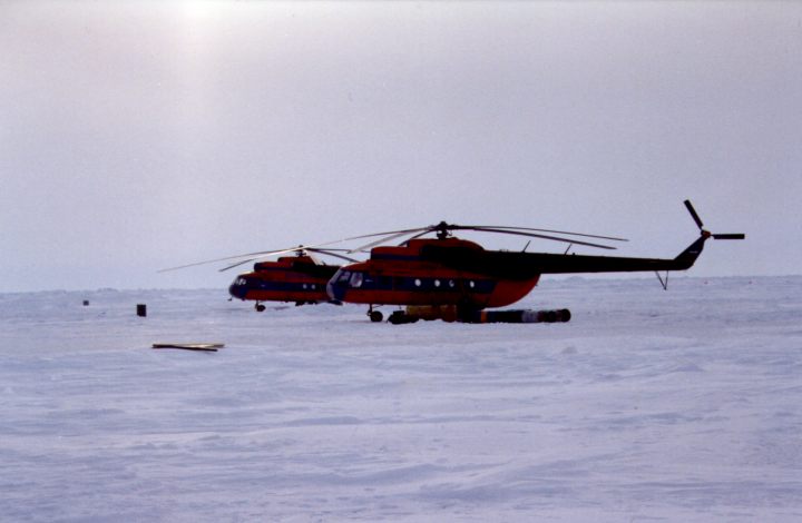 Russian helicopters sit ready for our expedition to the north pole