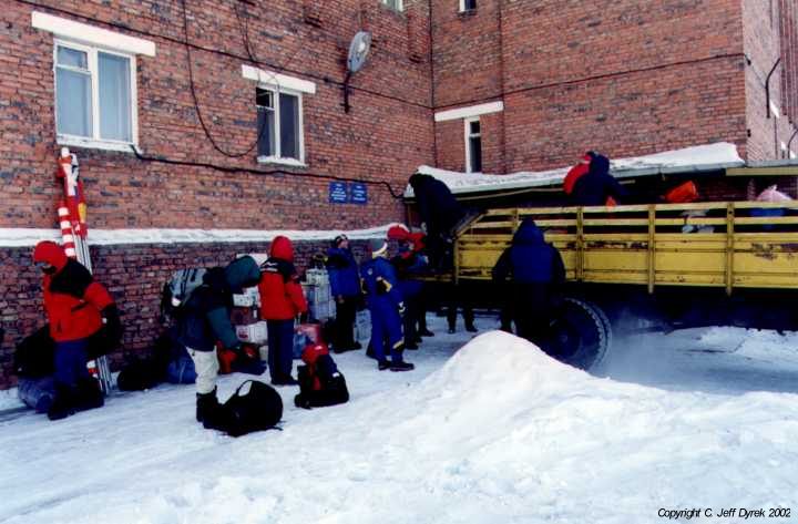 North Pole expedition members unload equipment into the Khatanga Hotel