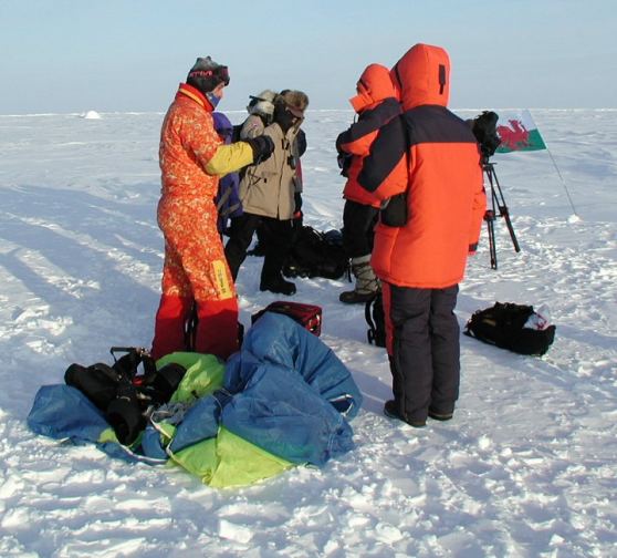 Skydivers picture on the north pole.