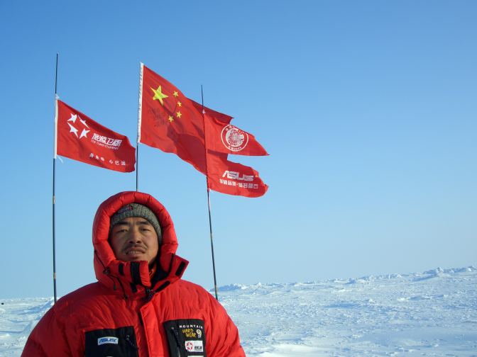 Cao Jun standing on the North Pole