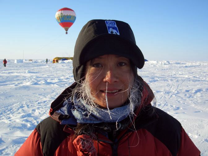 Wang Qiuyang in Camp Borneo near the North Pole in front of a hot air balloon