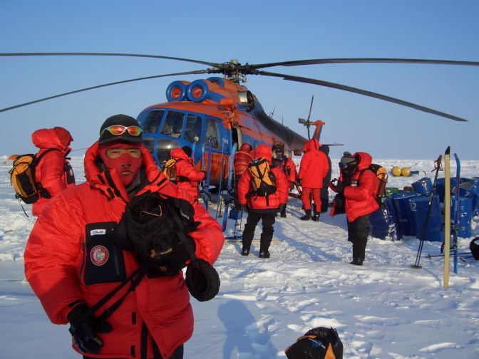 The Chinese Ski team loads into the Mi-8