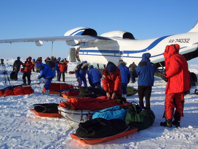 Ski team off loads the airplane for a fantastic ski vacation