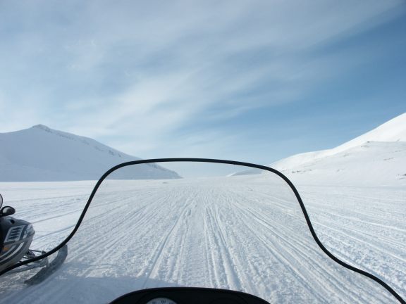 Driving the snowmobile to Barentsburg, Norway.