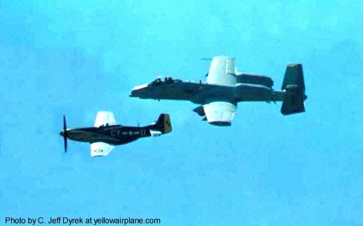 an a-10 thunderbolt II and a ww2 warbird p-51 mustang fly wingtip to wingtip