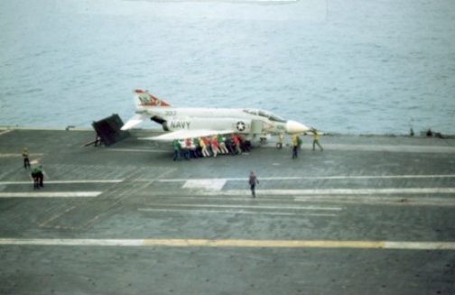 Getting the F-4 Phantom ready for launch from the catapult on the kitty hawk