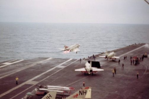 This F-4 Phantom is taking off from the USS Kitty and heading into North Viet Nam